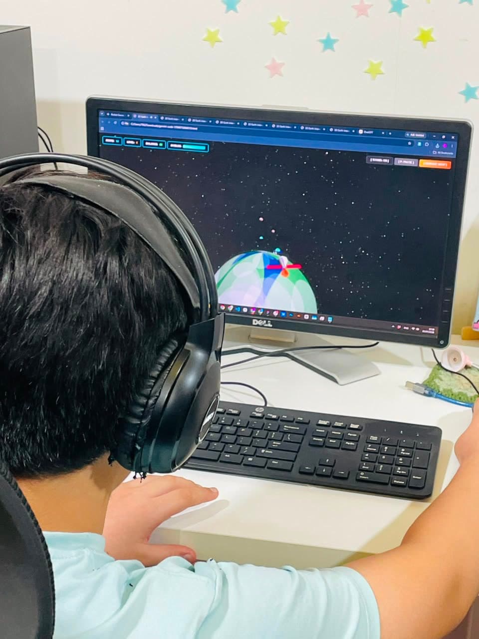 A student directing an AI tool on screen during a studio session